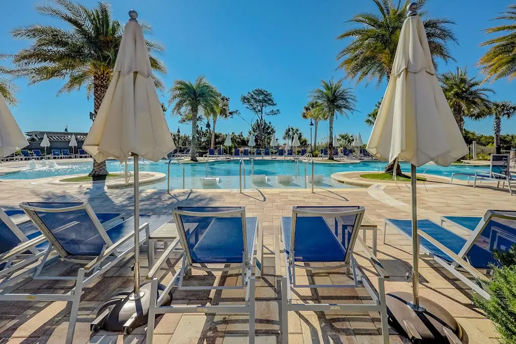 Modern condo with water views, central air-conditioning, shared pool, & hot tub