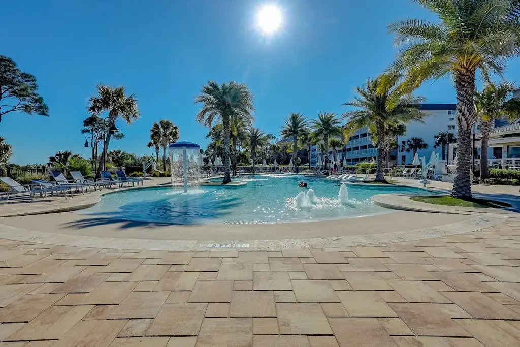 Modern condo with water views, central air-conditioning, shared pool, & hot tub