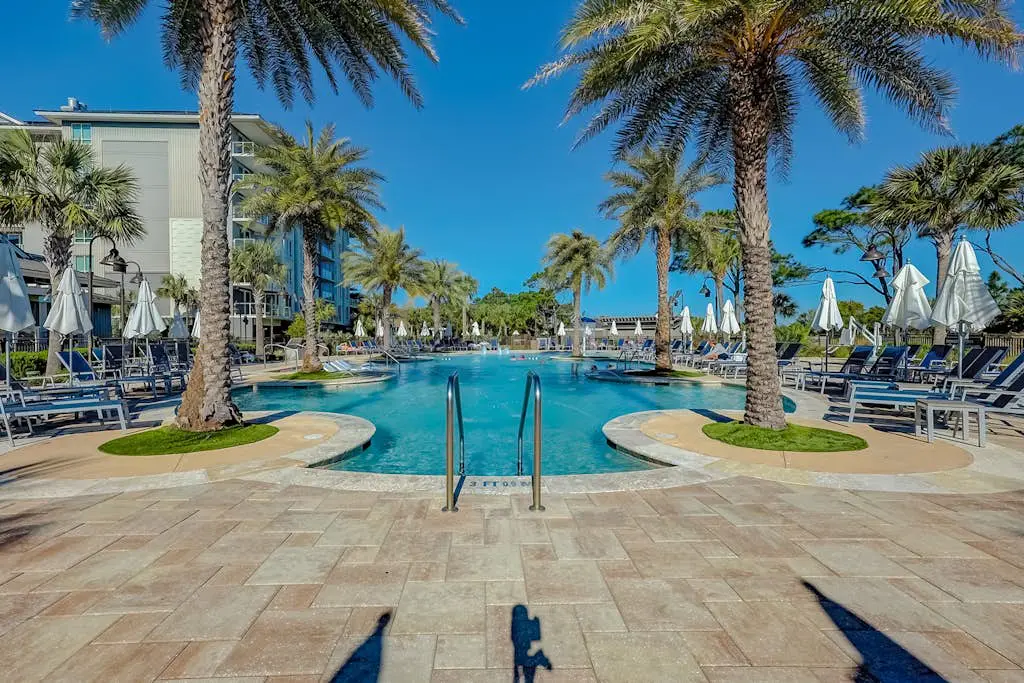 Modern condo with water views, central air-conditioning, shared pool, & hot tub
