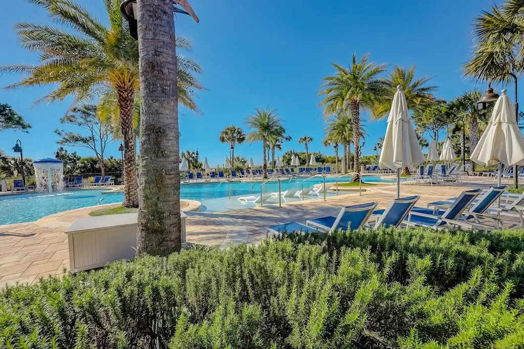 Modern condo with water views, central air-conditioning, shared pool, & hot tub