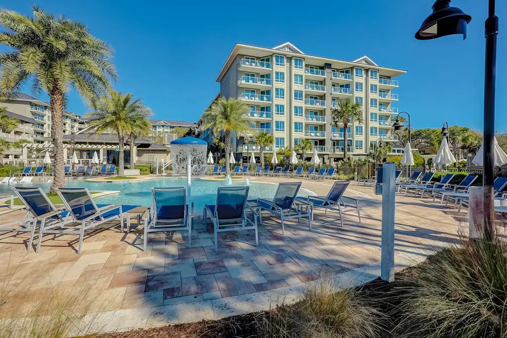 Modern condo with water views, central air-conditioning, shared pool, & hot tub