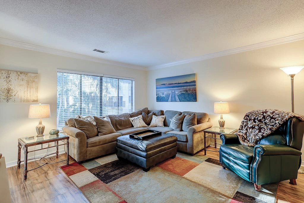 Relaxing condo with tennis court, pool, balcony, patio, kitchen, W/D, & kitchen