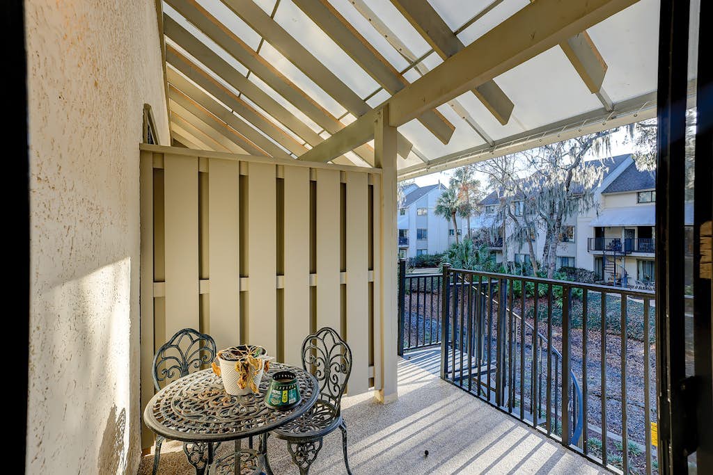 Relaxing condo with tennis court, pool, balcony, patio, kitchen, W/D, & kitchen