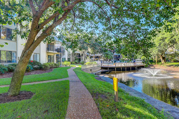 Relaxing condo with tennis court, pool, balcony, patio, kitchen, W/D, & kitchen