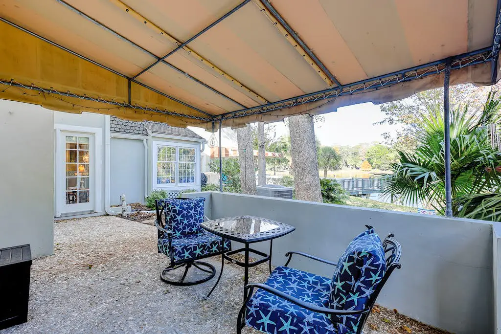 Coastal condo with private patio and lagoon view, golf, pool, tennis court & W/D