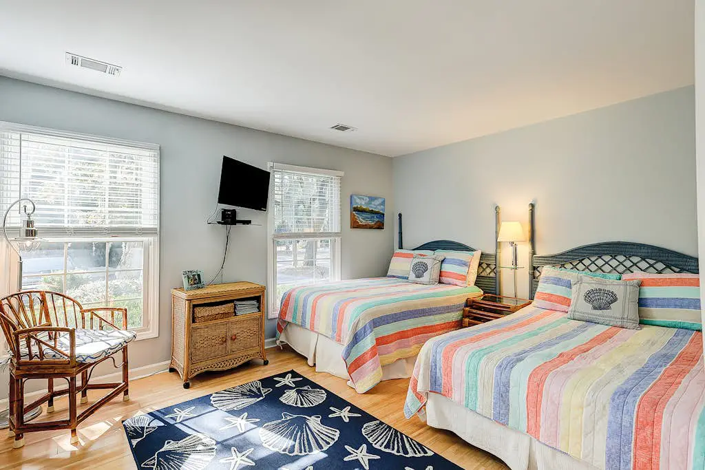 Coastal condo with private patio and lagoon view, golf, pool, tennis court & W/D