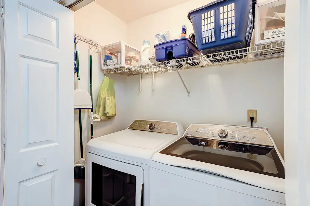 Coastal condo with private patio and lagoon view, golf, pool, tennis court & W/D