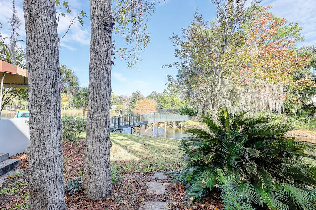 Coastal condo with private patio and lagoon view, golf, pool, tennis court & W/D