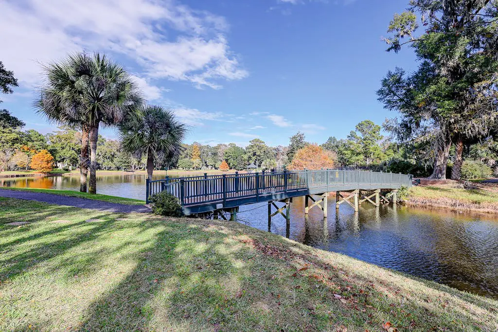 Coastal condo with private patio and lagoon view, golf, pool, tennis court & W/D