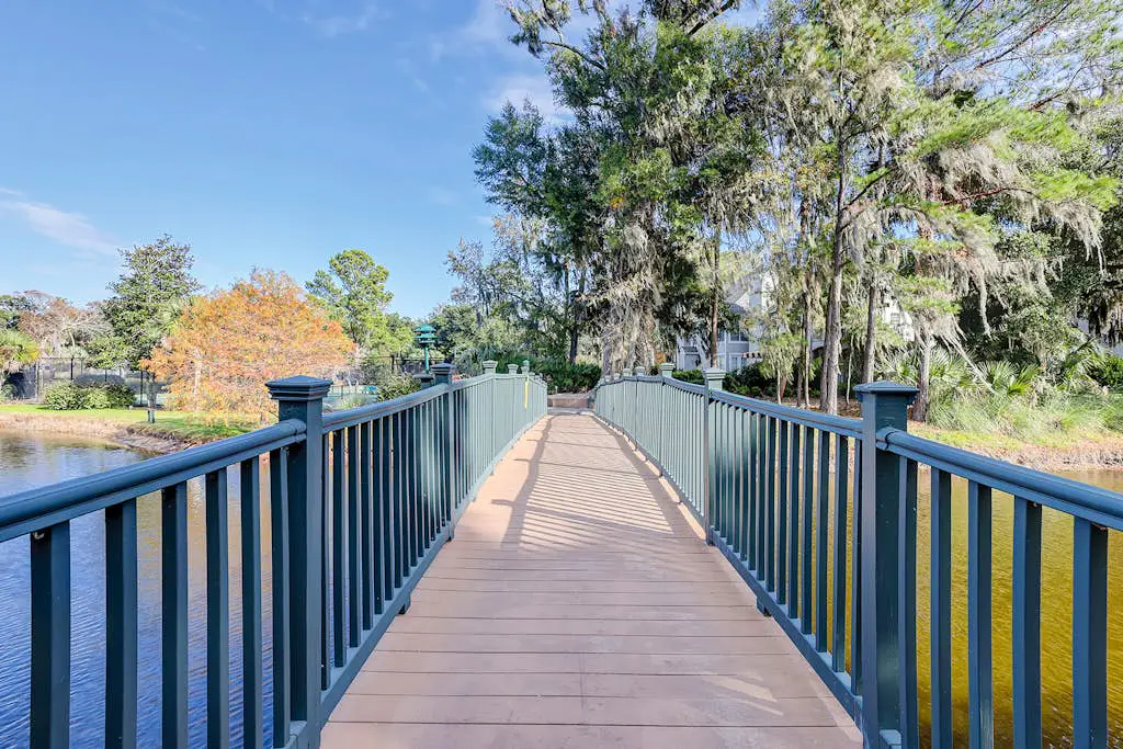 Coastal condo with private patio and lagoon view, golf, pool, tennis court & W/D