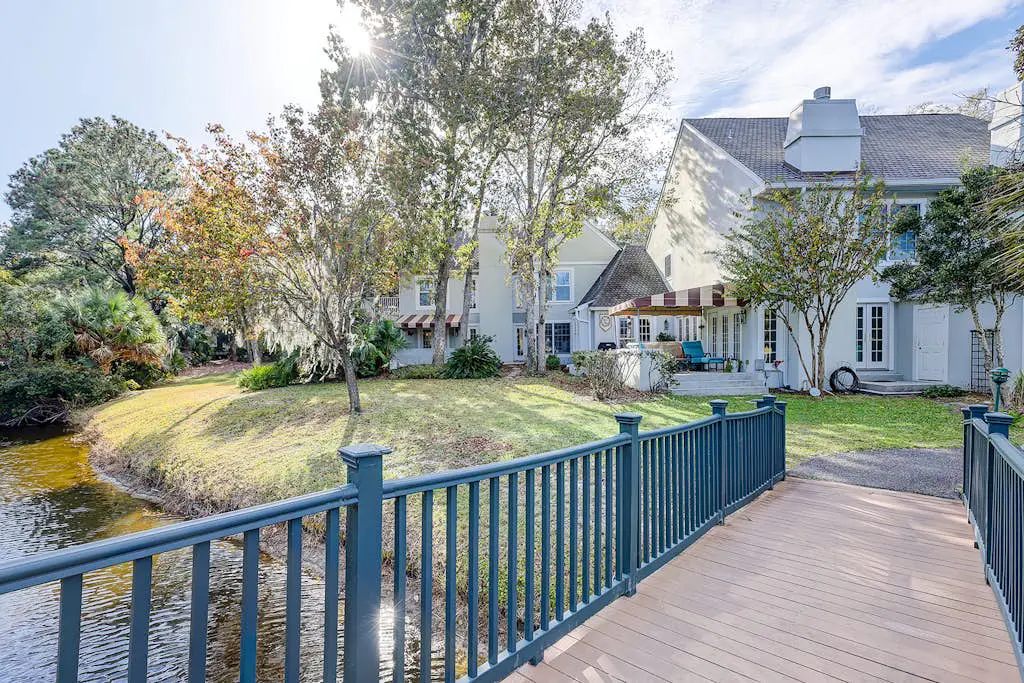 Coastal condo with private patio and lagoon view, golf, pool, tennis court & W/D