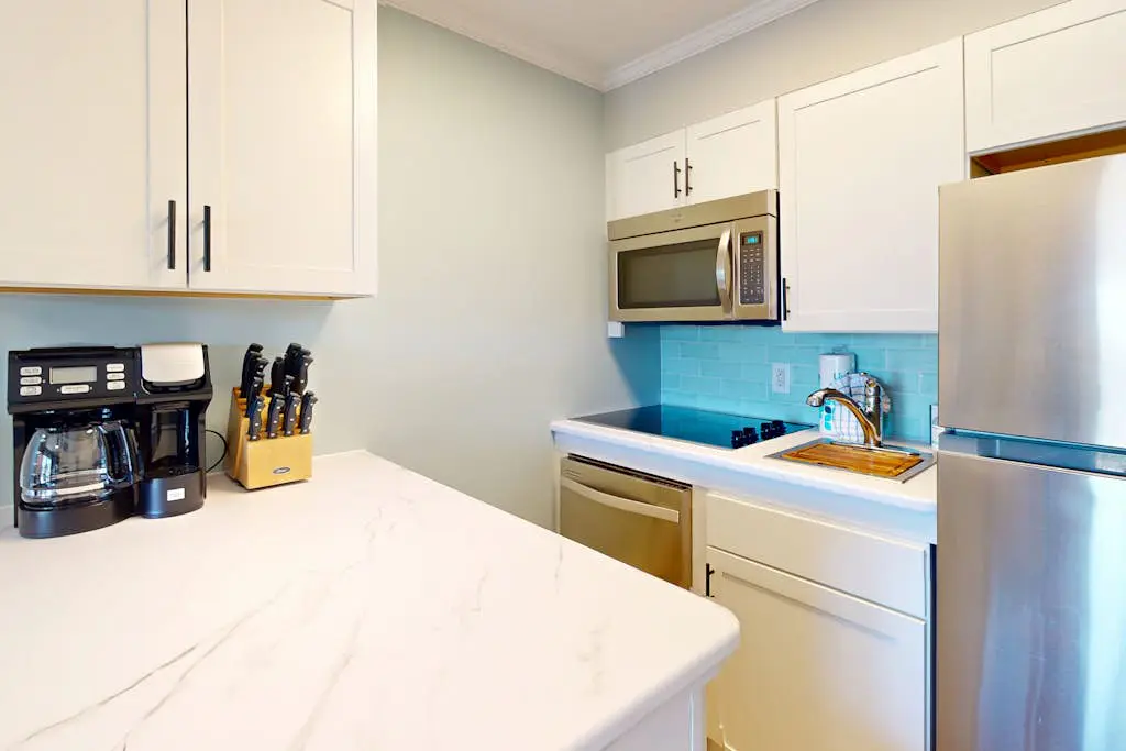 Beach-view condo in oceanfront complex with outdoor pool, beach access & balcony