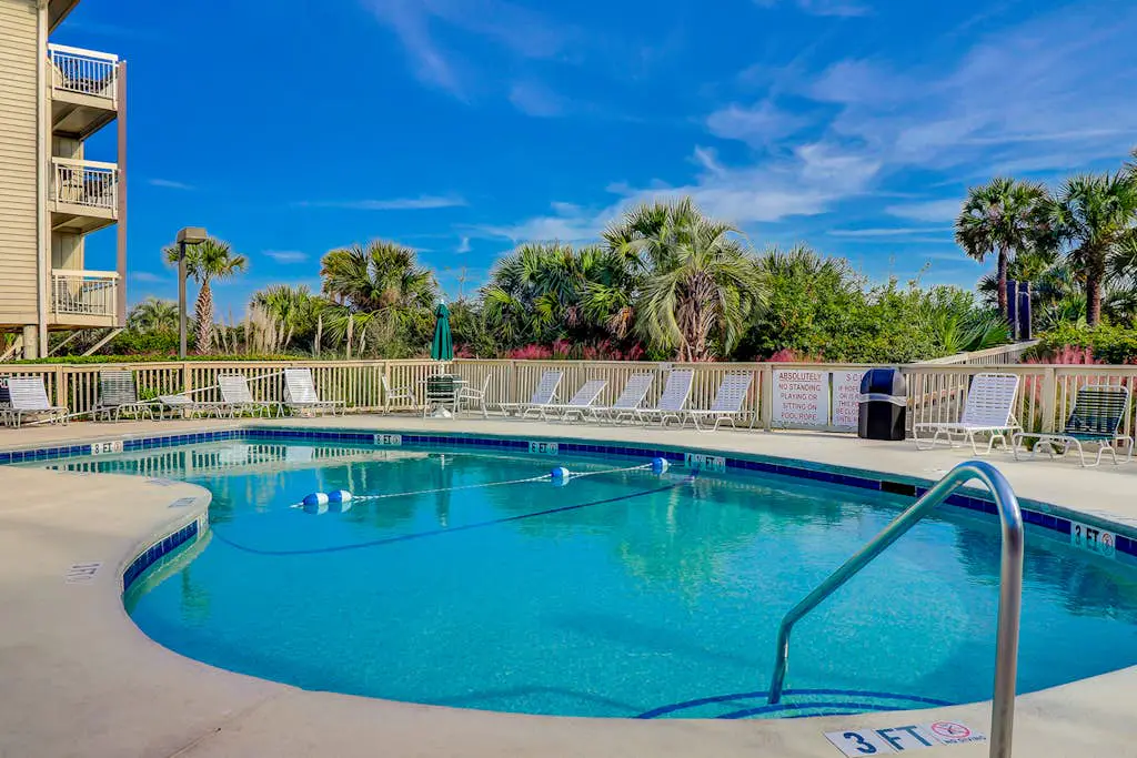 Beach-view condo in oceanfront complex with outdoor pool, beach access & balcony