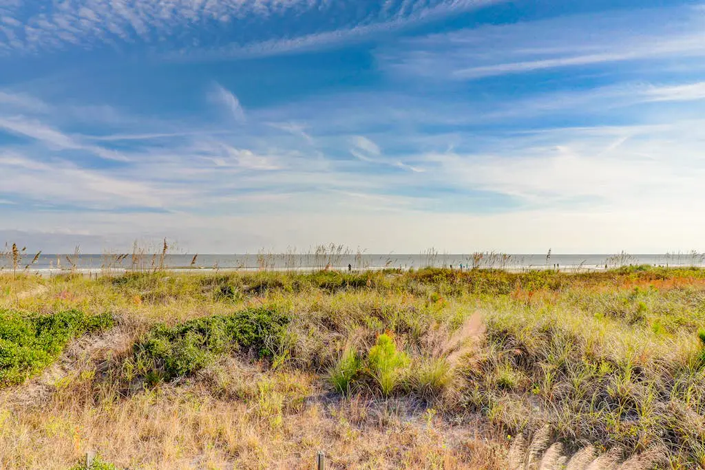 Beach-view condo in oceanfront complex with outdoor pool, beach access & balcony