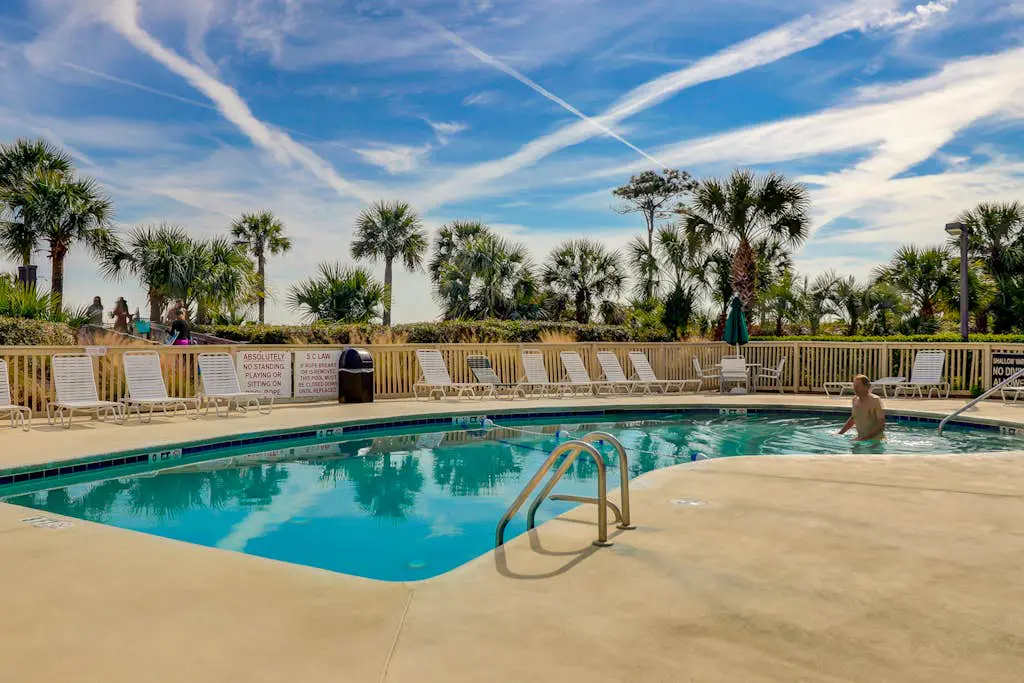 Beach-view condo in oceanfront complex with outdoor pool, beach access & balcony
