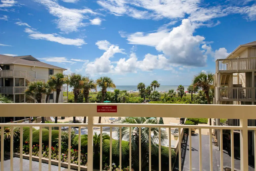 Beach-view condo in oceanfront complex with outdoor pool, beach access & balcony