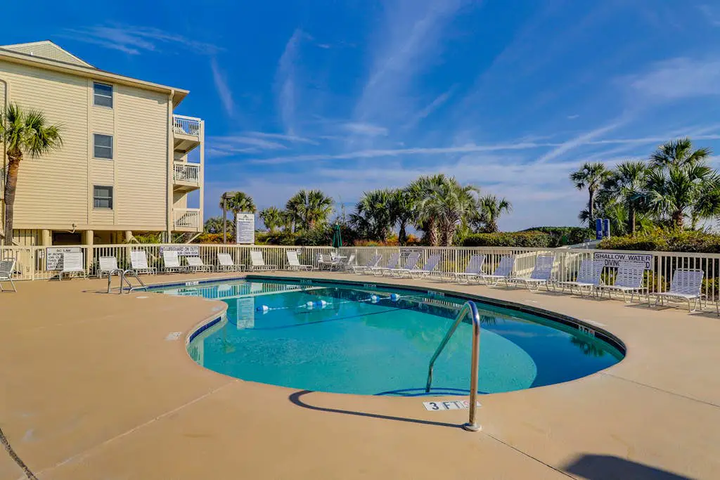 Beach-view condo in oceanfront complex with outdoor pool, beach access & balcony