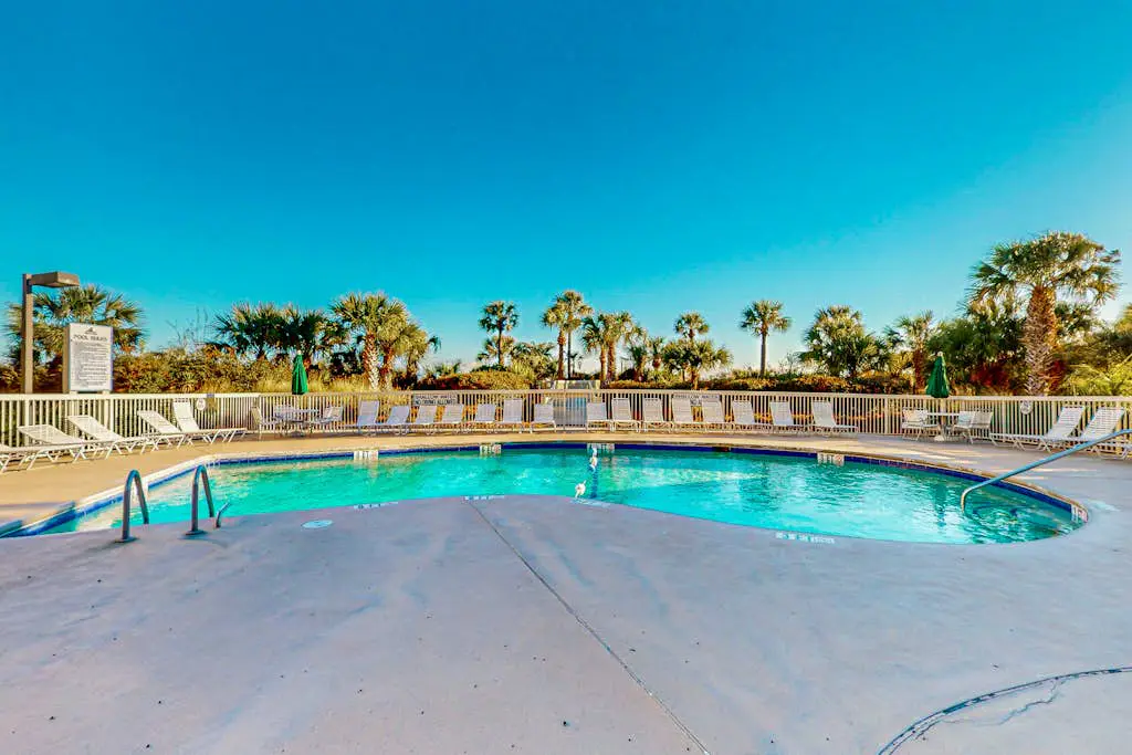Beach-view condo in oceanfront complex with outdoor pool, beach access & balcony