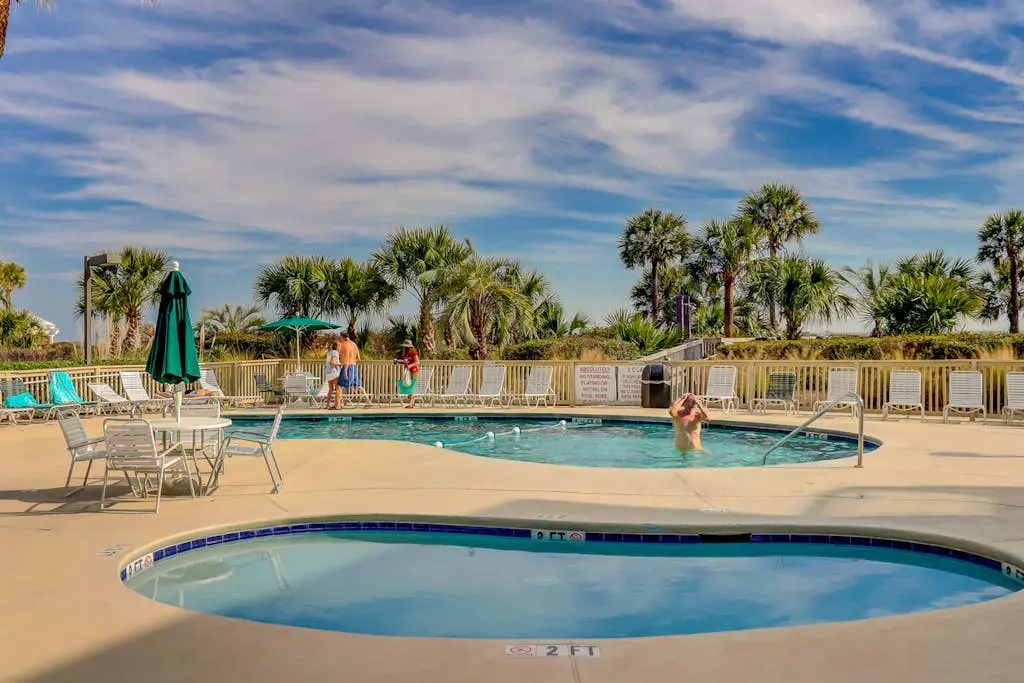 Beach-view condo in oceanfront complex with outdoor pool, beach access & balcony