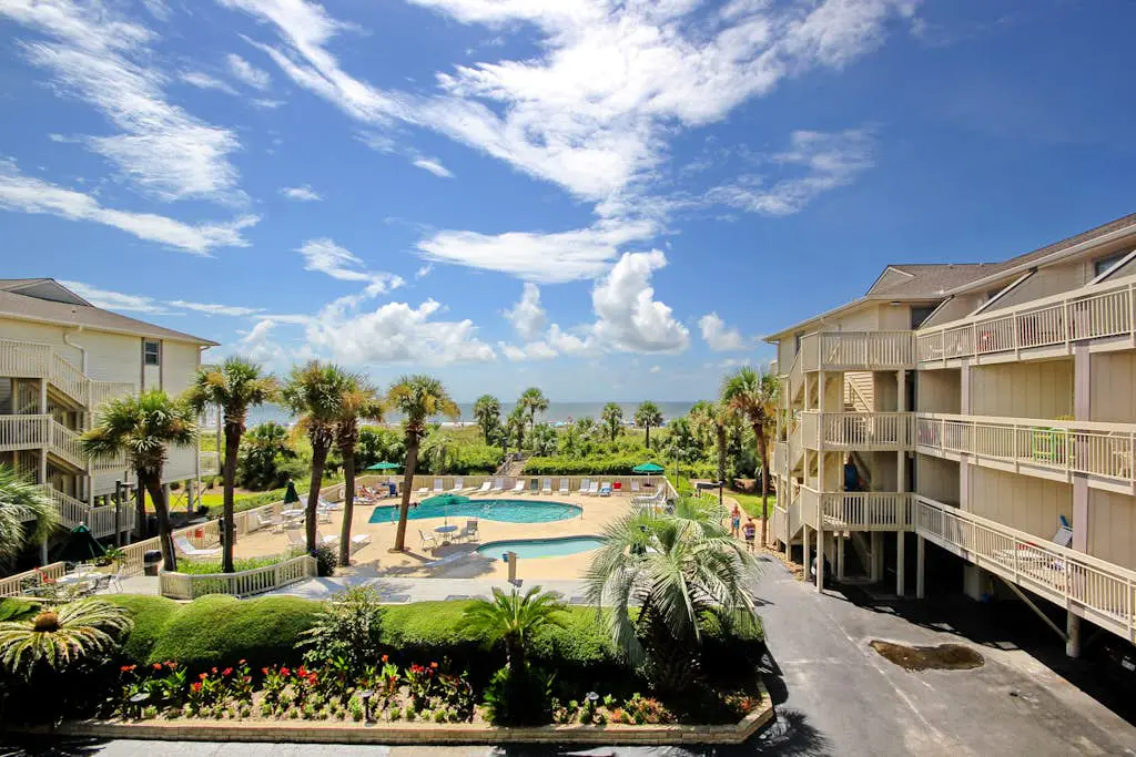 Beach-view condo in oceanfront complex with outdoor pool, beach access & balcony