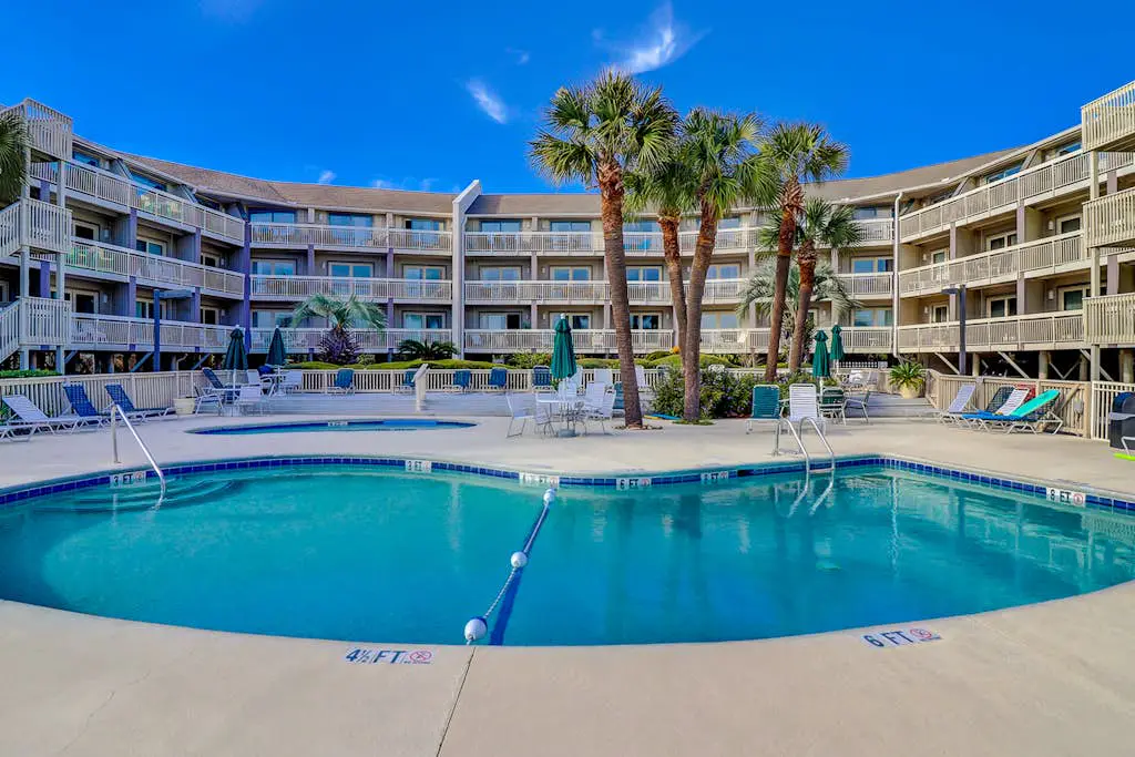 Beach-view condo in oceanfront complex with outdoor pool, beach access & balcony