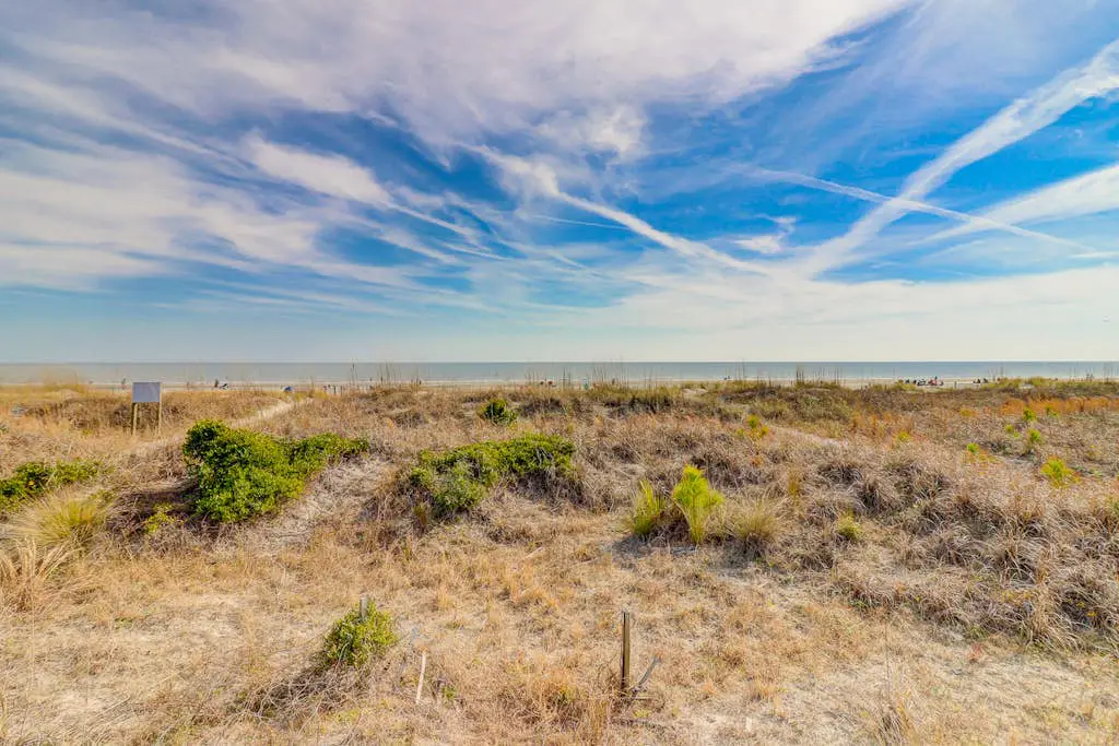 Beach-view condo in oceanfront complex with outdoor pool, beach access & balcony