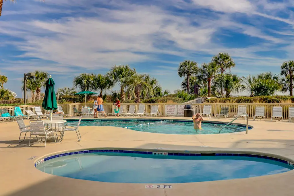 Beach-view condo in oceanfront complex with outdoor pool, beach access & balcony