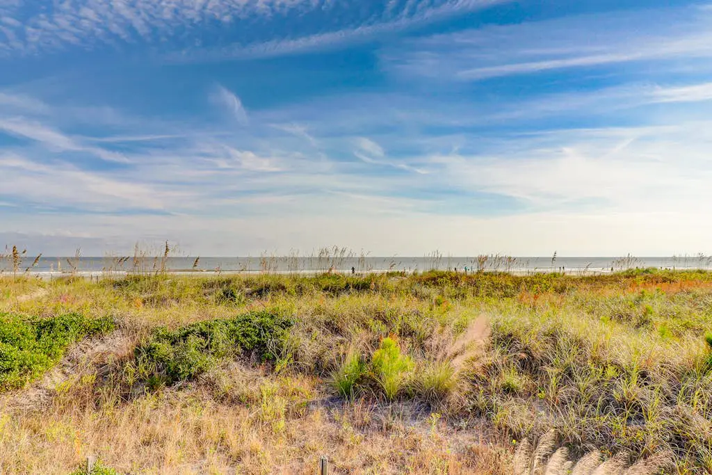 Beach-view condo in oceanfront complex with outdoor pool, beach access & balcony