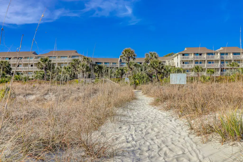 Beach-view condo in oceanfront complex with outdoor pool, beach access & balcony