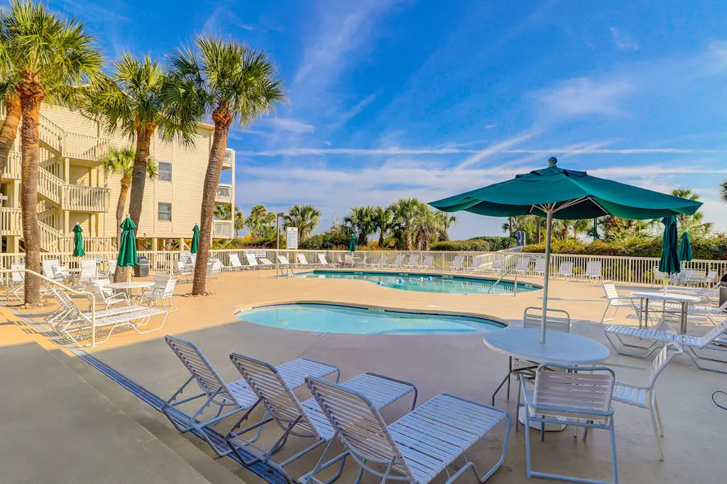 Beach-view condo in oceanfront complex with outdoor pool, beach access & balcony
