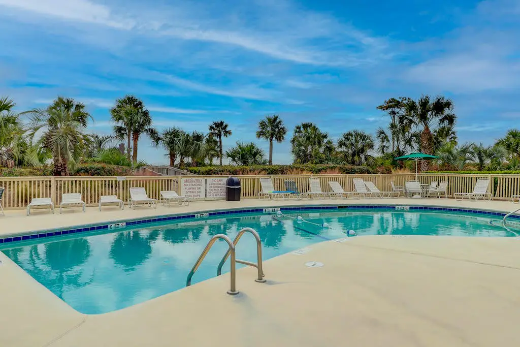 Beach-view condo in oceanfront complex with outdoor pool, beach access & balcony