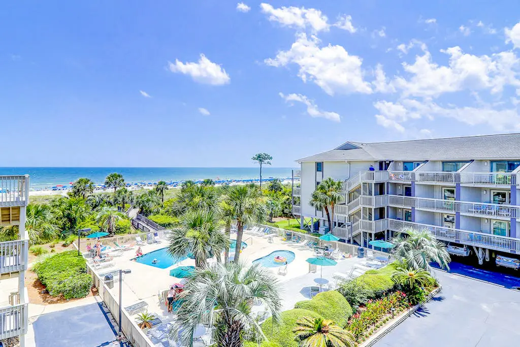 Beach-view condo in oceanfront complex with outdoor pool, beach access & balcony