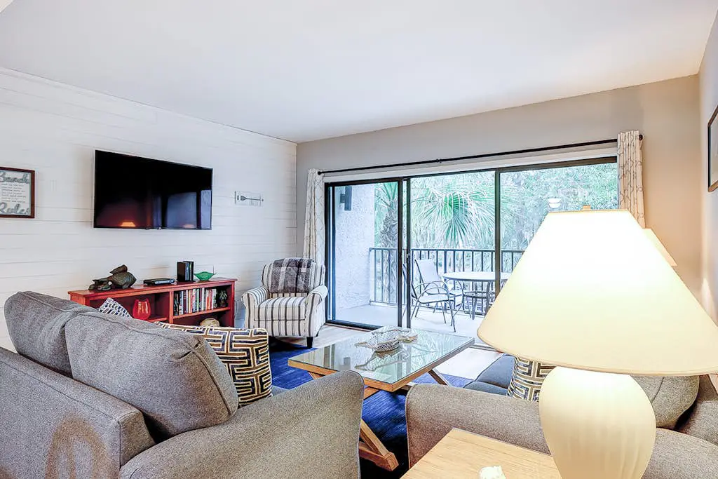 Family-friendly condo near the beach with balcony, central AC, & shared pool