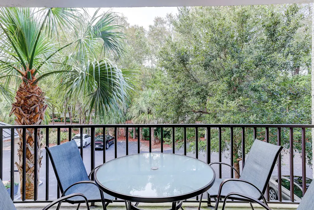 Family-friendly condo near the beach with balcony, central AC, & shared pool