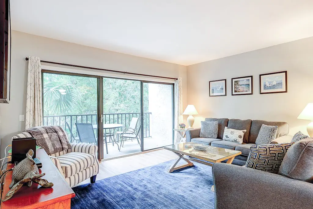 Family-friendly condo near the beach with balcony, central AC, & shared pool