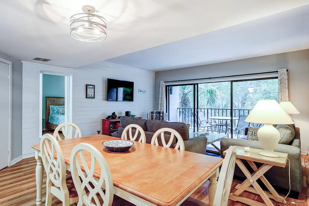 Family-friendly condo near the beach with balcony, central AC, & shared pool