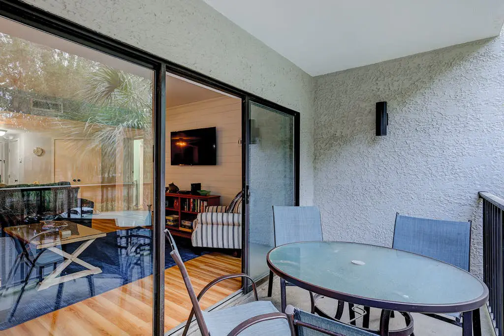 Family-friendly condo near the beach with balcony, central AC, & shared pool