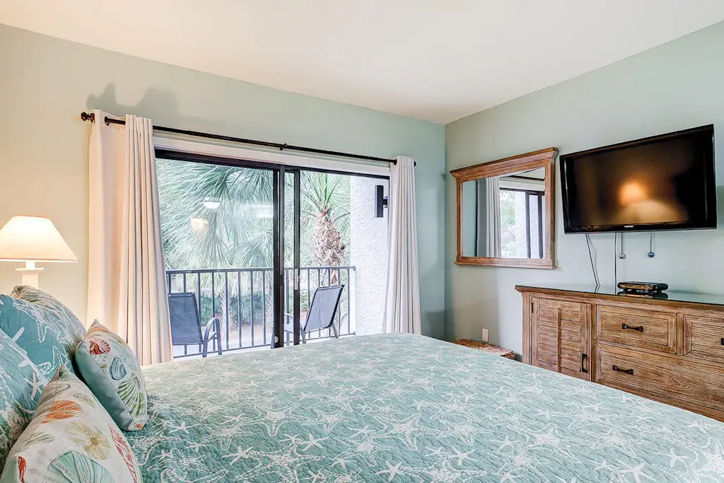 Family-friendly condo near the beach with balcony, central AC, & shared pool