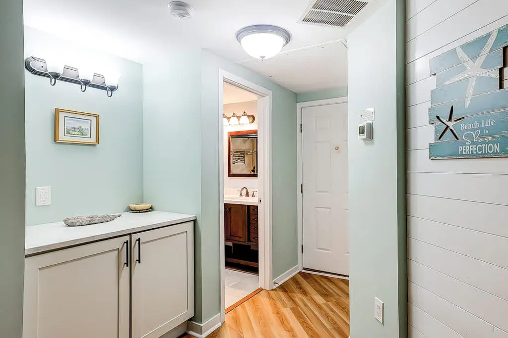 Family-friendly condo near the beach with balcony, central AC, & shared pool