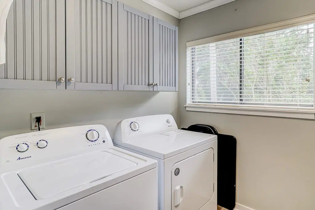 Well-appointed home with path to the beach, pool, private washer/dryer & AC