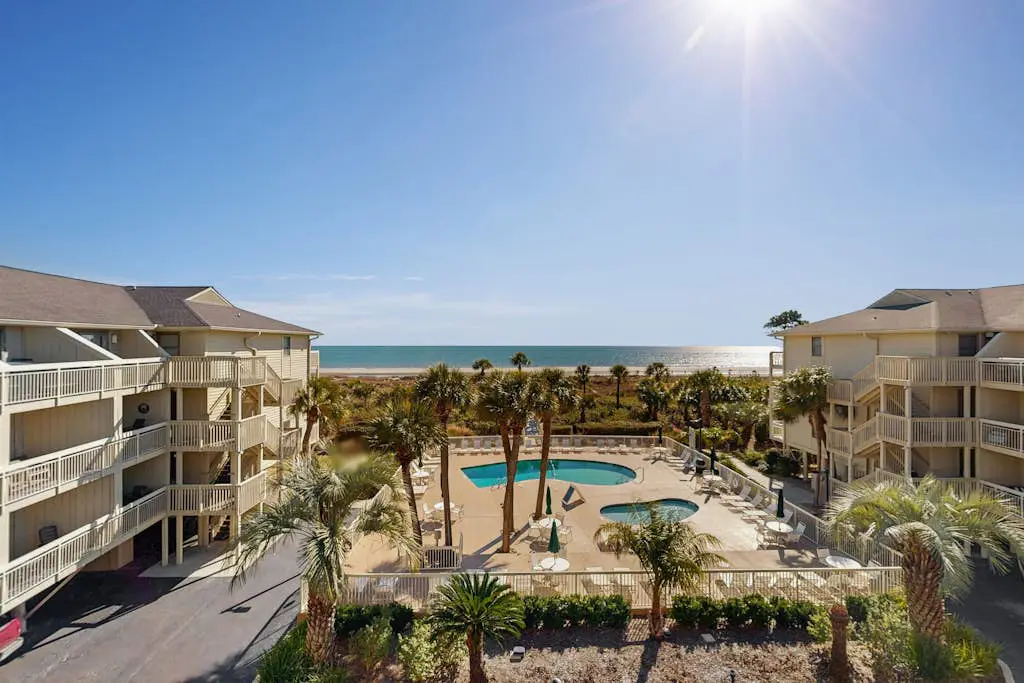 Beach condo with Ocean Views, outdoor pool & balcony - Walk to Beach