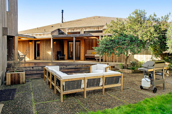 Breaker House - Ocean View Home with Lofty Ceilings, Fireplace & Courtyard - Steps to Bluff Trail