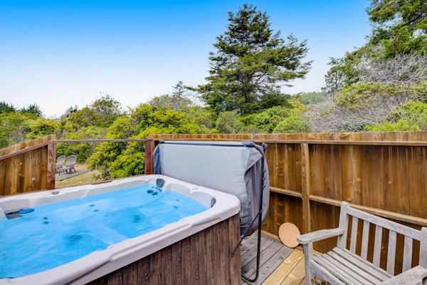 Stunning home with sweeping ocean views, private hot tub & outdoor living