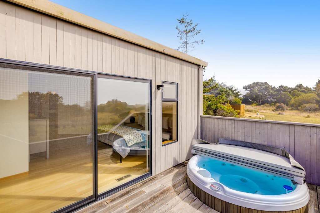 Heron's Nest - Panoramic ocean-view home with private hot tub on the golf course