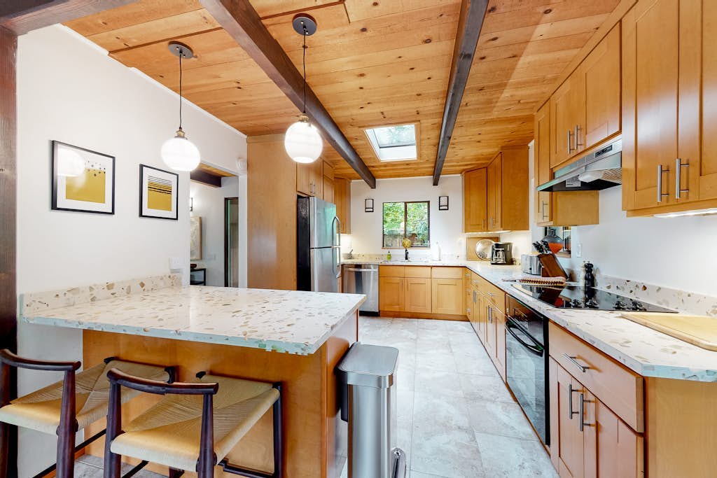 Mid-century home in the redwoods with expansive deck, garden & woodstove