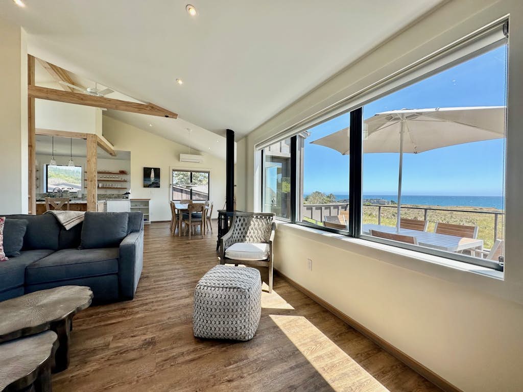 Ocean view home steps from rec center with private hot tub, pools, and saunas.
