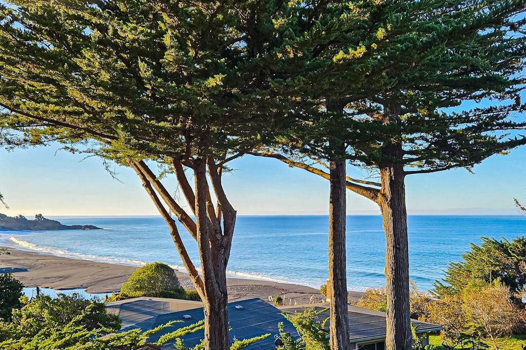 Ocean-view home & studio with hot tub, outdoor kitchen, fire table, wood stove