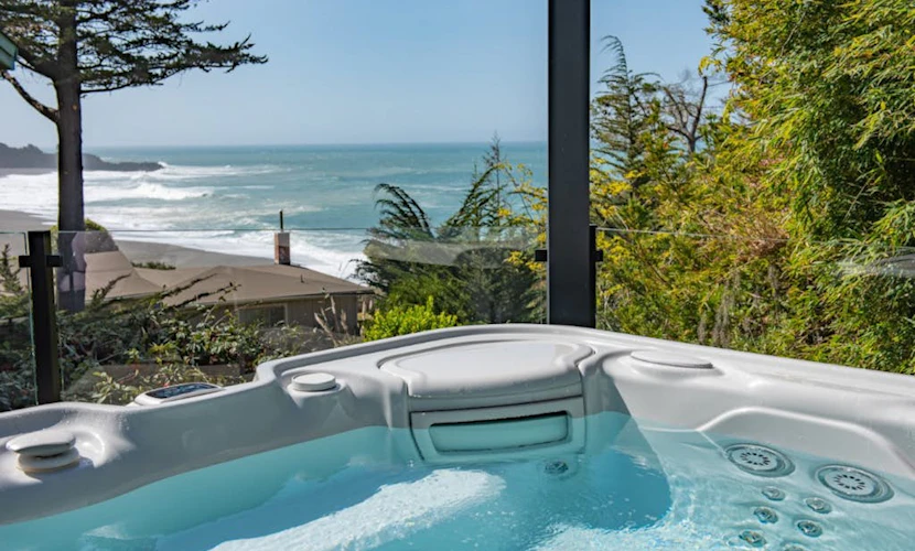 Ocean-view home & studio with hot tub, outdoor kitchen, fire table, wood stove