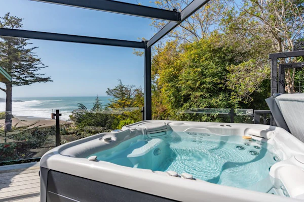 Updated home with ocean views, private hot tub, fire table, outdoor kitchen