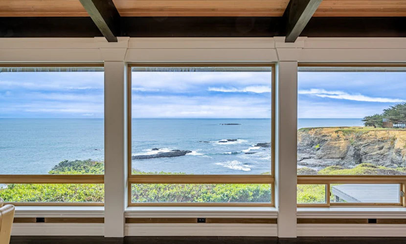 Blufftop home with hot tub & forever oceanfront views & private cottage